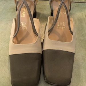 Light grey/pewter colored heels. Shoes are leather lined and fabric exterior.